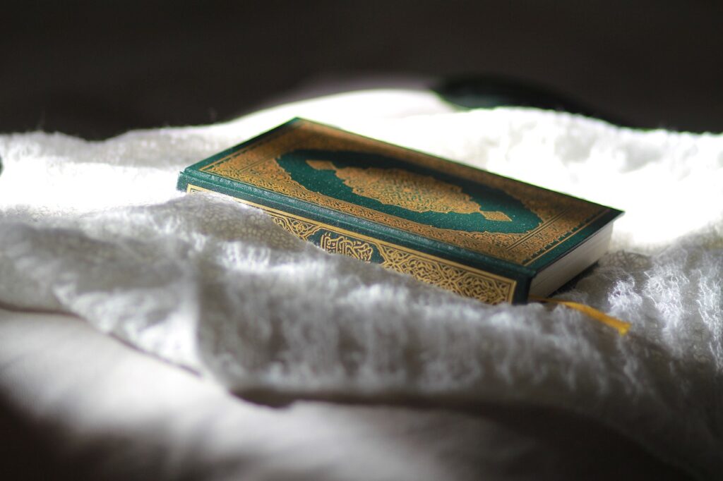 The Quran over the towel