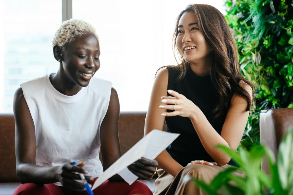 Two person talking to each other for Eco-Friendly Franchises