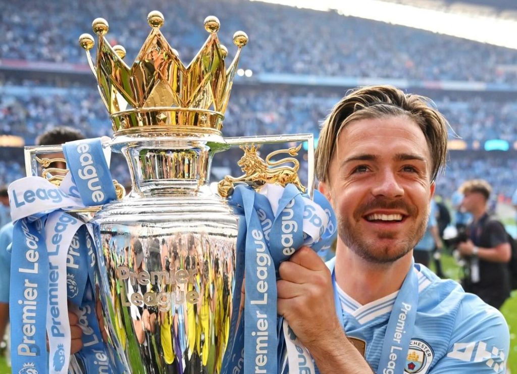 Jack Grealish with premier league trophy