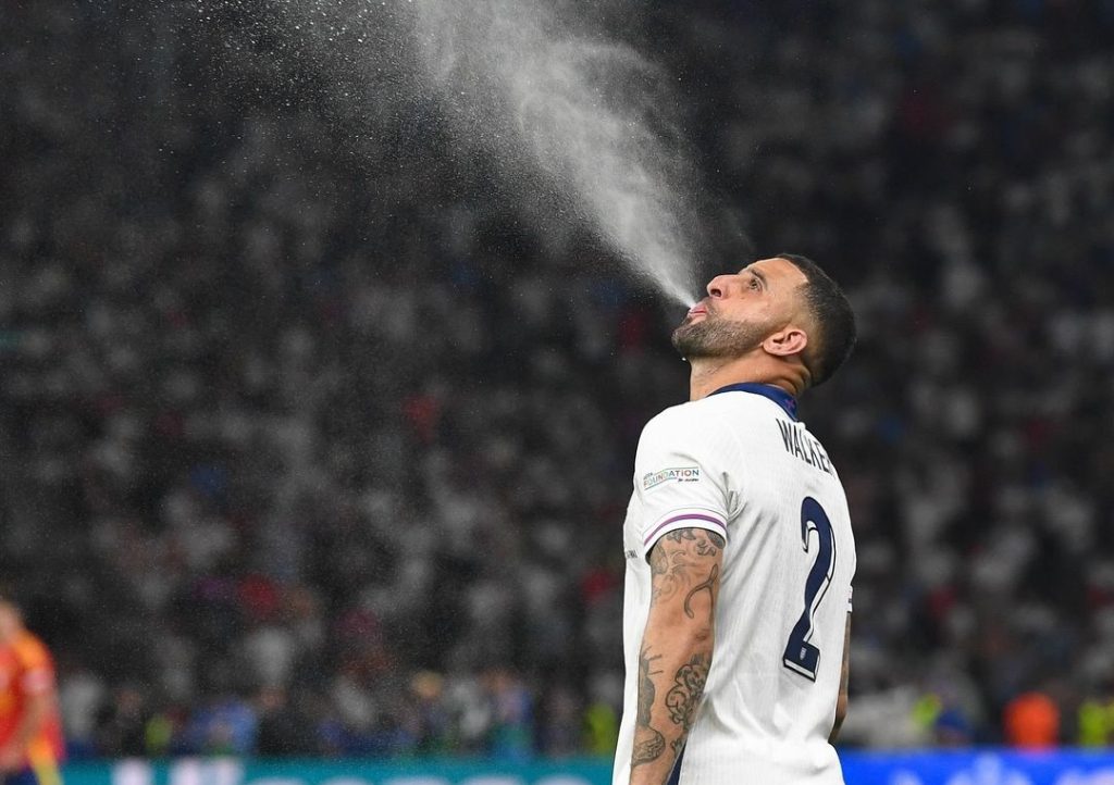 Kyle walker in England jersey spitting in air