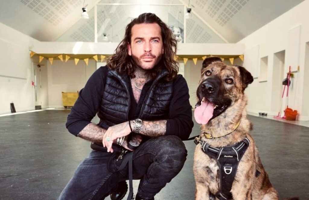 Pete Wicks with a dog