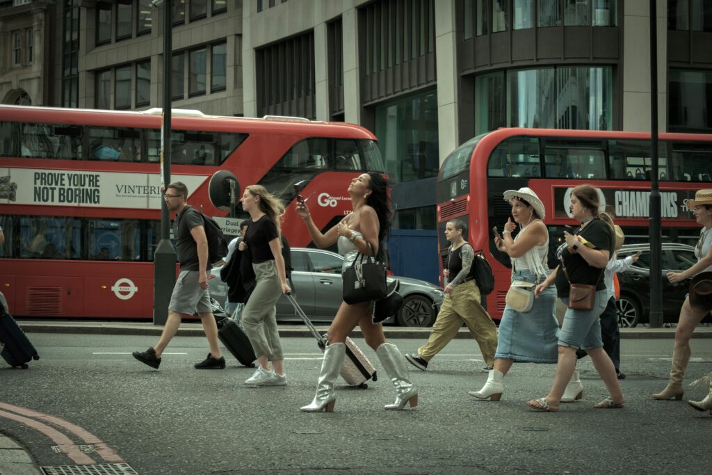 people walking on the road of london