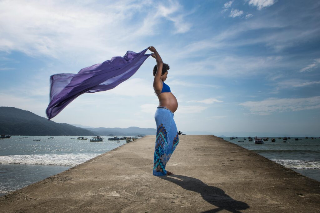 A pregnant lady posing