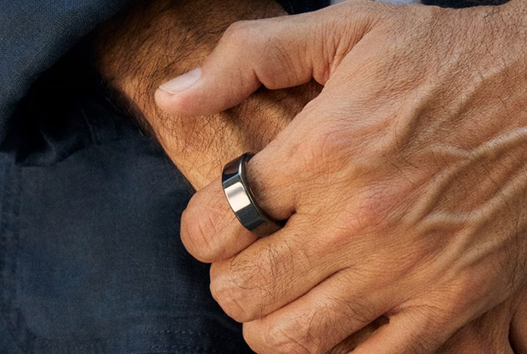 OURA RING in a male hand