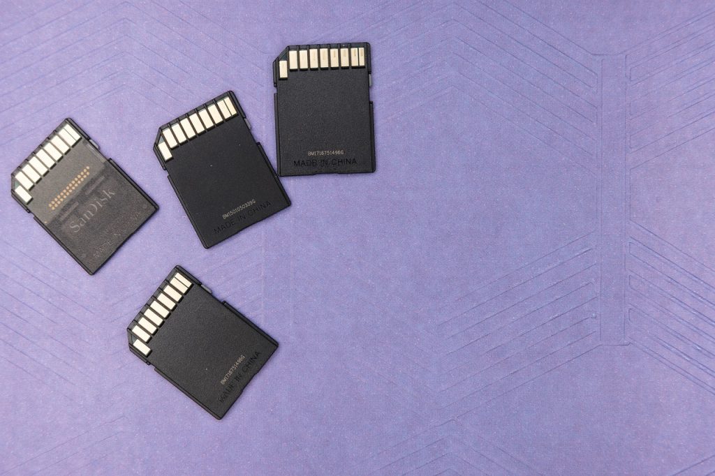 sd cards lieing on the a purple floor